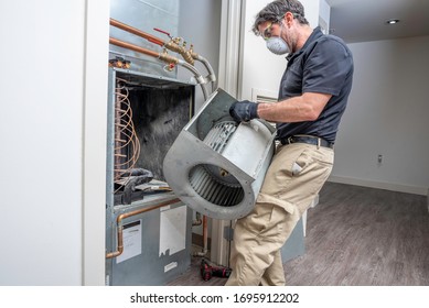 HVAC Tech Repairing A Blower Motor