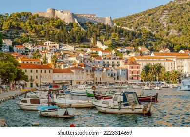 Hvar harbour in the old town of Hvar and the Spanish fortress above the town, a popular tourist destination in Dalmatia, Croatia. - Powered by Shutterstock