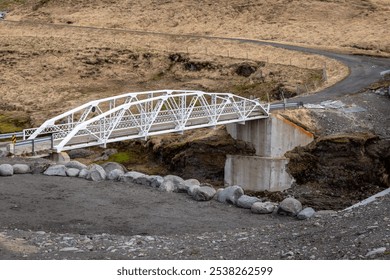 Hvita New York bridge, white steel old bridge over the Jokulsa a Bru river, access to the Studlagil canyon, East Iceland.  - Powered by Shutterstock