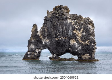 Hvitserkur (Troll of Northwest Iceland), basalt rock stack protruding from Hunafloi Bay, Iceland.  - Powered by Shutterstock