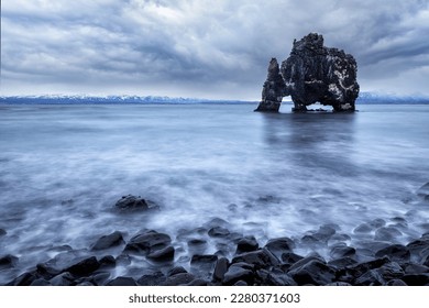 Hvitserkur, Troll Rock on a black lava beach. A natural basalt rock formation shaped like an elephant or mammoth , Northwestern Region, Iceland. Long exposure. - Powered by Shutterstock