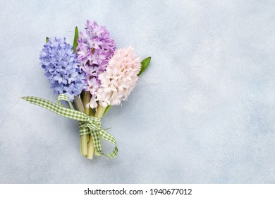Hyacinth flowers bouquet. Easter greeting card template. Top view flat lay. With space for your greetings