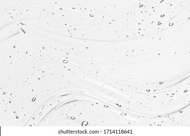 Hyaluronic acid serum texture. Beauty skin care liquid gel background. Clear cosmetic cream with bubbles closeup - Shutterstock ID 1714118641
