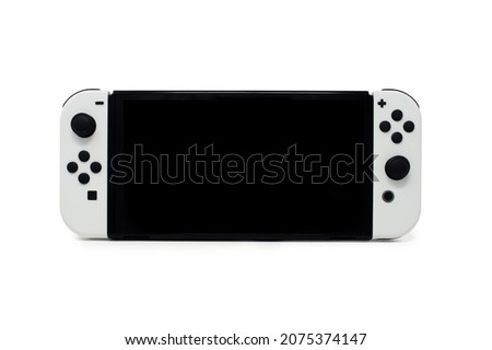 Hybrid next gen video game console with switch detachable controllers on both sides. The screen is oled and the gamepads white.