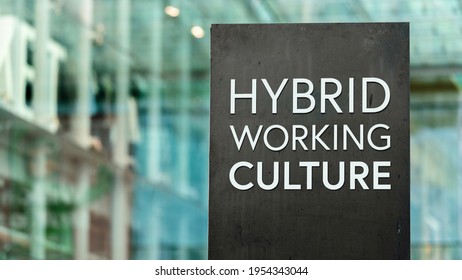 Hybrid Working Culture Sign In Front Of A Modern Office Building