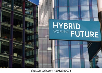 Hybrid Working Future Sign In Front Of City Skyscrapers