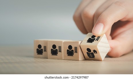 Hybrid Workplace Schedule, Gig Economy, Freelance, Online Business Network Communication, Teamwork, Home Office Concept. Hand Flip Wooden Cube Icon Of Gig Economy, Copy Space For Background Or Text.