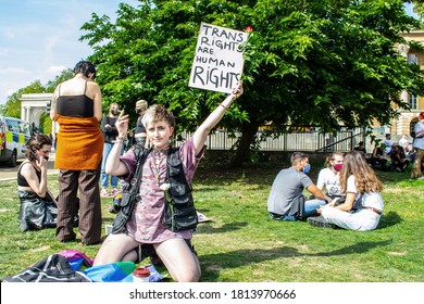 HYDE PARK CORNER, LONDON/ENGLAND- 12 September 2020: Protester with a ‘Trans rights are human rights’ placard at the beginning of Trans Pride 2020 in London - Shutterstock ID 1813970666