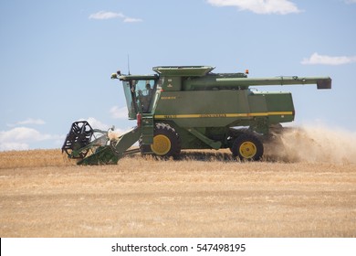 HYDEN, Australia - November 26, 2016: Combine Harvester Harvests Ripe Wheat On A Wheat Field

