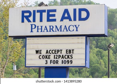 Hyden, Kentucky/United States, May 1, 2019:  Rite Aid Sign Advertising Acceptance Of EBT (food Stamps) And Coke For Sale.