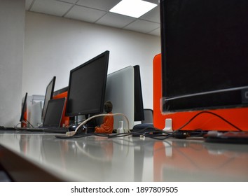 Hyderabad, India - January 19, 2021: Employees Work In Office Buildings Cooperate Company With Orange Furniture