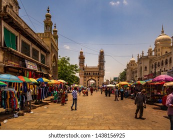 Hyderabad, India - June 17, 2019 : The Charminar, panoramic view of the iconic monument and mosque & street shops around the place