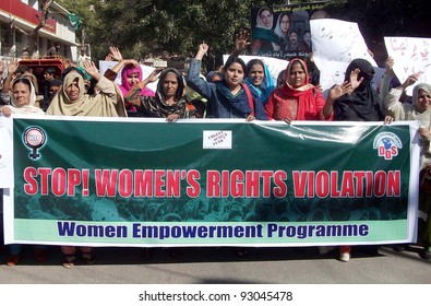 HYDERABAD, PAKISTAN - JAN 18: Supporters Of Women Empowerment Programme (an NGO) Chant Slogans Against Women Rights Violations During Protest Rally On January 18, 2012 In Hyderabad.