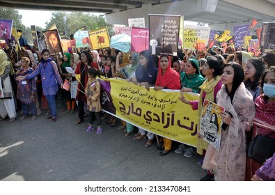 HYDERABAD, PAKISTAN - MAR 08: Social organization are holding torchlight rally for women rights in connection with the Women March occasion of International Women Day on March 08, 2022 in Hyderabad.