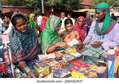 HYDERABAD, PAKISTAN - NOV 04: People from Hindu Community are busy in buying fire crackers on the occasion of Hindu Festival Diwali, on November 04, 2021 in Hyderabad. 