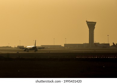 Hyderabad, Telangana, India, March 1, 2021, A Silhouetted Passenger Flight Landing At Rajiv Gandhi International Airport(RGIA), Hyderabad