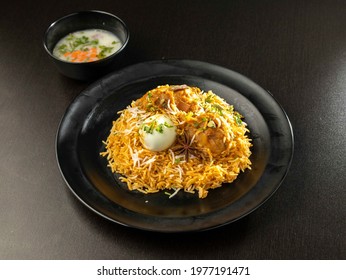 Hyderabadi Chicken Dum Biryani With Egg