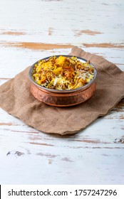 Hyderabadi Vegetable Dum Biryani - Paneer, Potato, Carrots, Peas cooked along with spiced rice