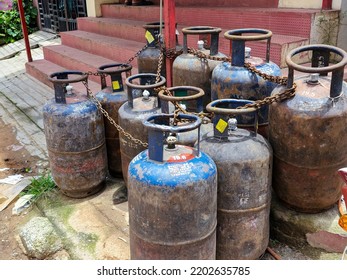 Hyderabad,India- August 6th 2022; Bunch Of Old Rusty LPG Gas Cylinders For Kitchen Cooking Kept Outside Of The Gas Station Or Store For Filling Gas.Picture Captured Under Natural Light.focus On Object