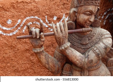 HYDERABAD<INDIA-JANUARY 14:Indian Hindu God Sri Krishna Wooden Carving,playing Flute,worship  Is Part Of Vaishnavism, Incarnation Of Lord Vishnu On January,14,2017 In Hyderabad,India.               