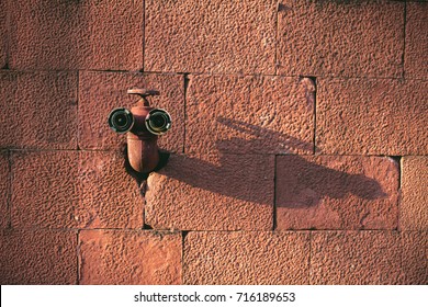 Hydrant on the wall 