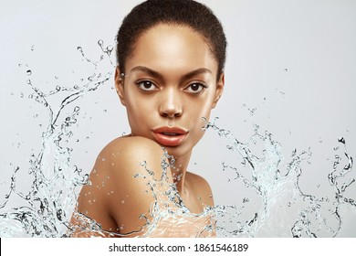 Hydration. African American skincare model. Beauty spa treatment concept. Water splash - Powered by Shutterstock