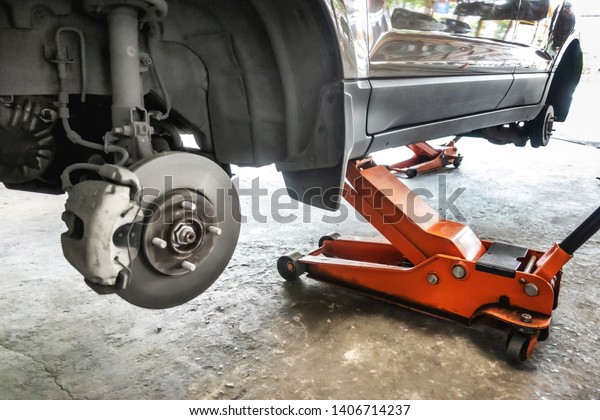 Hydraulic\
car jack lift the new car for change the\
tyre