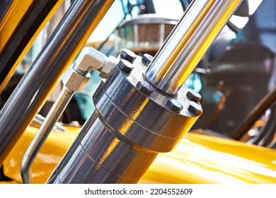 Hydraulic cylinder of front loader - Shutterstock ID 2204552609