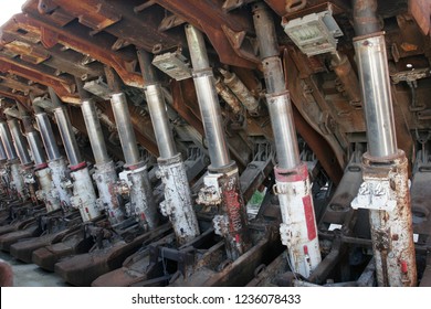 Hydraulic cylinders in abandoned coal mine.