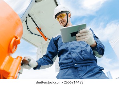 Hydraulic engineer control with computer on new installation hoses pneumatic piston of industrial machine of mining. Concept industry work of mine.