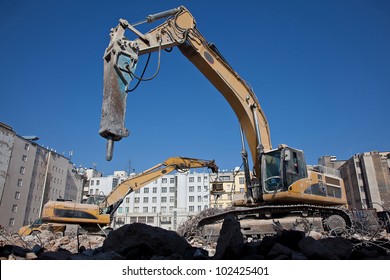 Hydraulic hammer on demolitiom of old buildings - Powered by Shutterstock