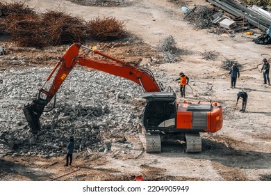 Hydraulic hammer on demolitiom of old buildings, Hydraulic hammer working on the repair works in site - Powered by Shutterstock