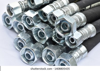 Hydraulic industrial hoses on a white background.