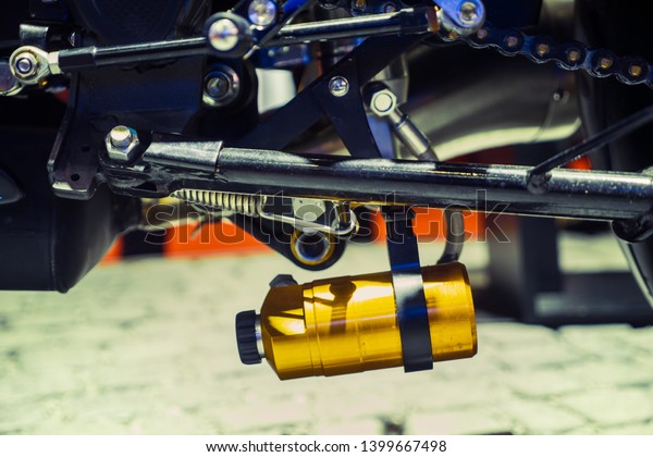 Hydraulic shock absorber oil cylinder motorcycle.\
Motorcycle vibration\
system.