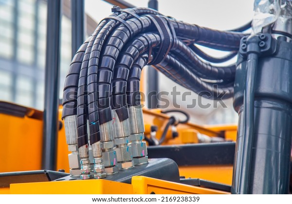 Hydraulic system of heavy industry machine.\
Pipes and hoses of construction\
machinery.