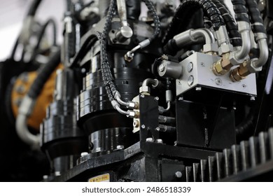 Hydraulic system of industrial construction equipment. Selective focus.