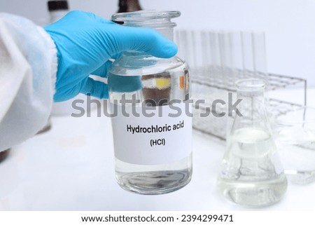 Hydrochloric acid in containers, Hazardous chemicals and raw material, chemical in industry or laboratory