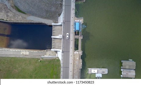 Hydroelectric Dam - Top down aerial image showing both sides with cars passing.