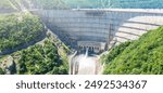 Hydroelectric power plant. Aerial view huge water dam. Hydropower energy station or HPP