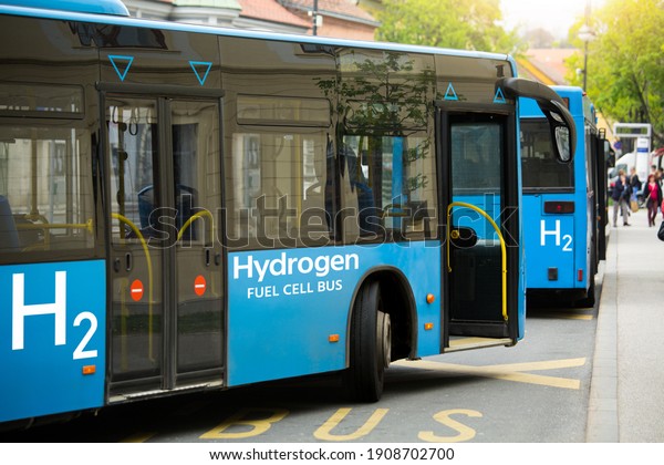 A\
hydrogen fuel cell buses stands at the bus\
station