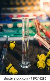 hydrometer measuring gravity of battery distilled water