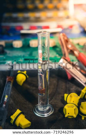 hydrometer measuring gravity of battery distilled water