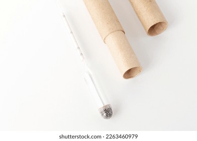 hydrometer, a tool for measuring the density of the battery electrolyte, on a white background