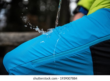 Hydrophobic Effect On Blue Waterproof Fabric On Mountain Trousers.