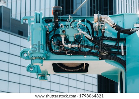 Hydrostatic crane engine.The control system of the crane engine.Lifting hydraulic Department on the truck crane.The hydraulic system of the engine.hydraulic hoses on the crane.autoparts