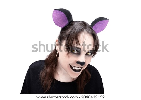 Hyena cosplay girl isolated on white background. Animal make-up. Cartoon character.