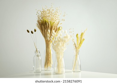Hygge Concept, Dried Flowers In Vases On Table