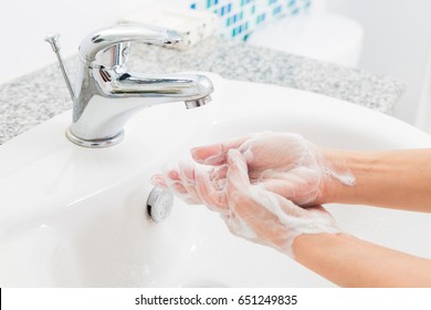 Hygiene. Cleaning Hands. Washing hands on sink.