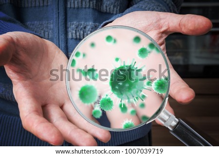 Hygiene concept. Man is showing dirty hands with many viruses and germs.
