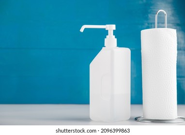 Hygiene Concept, Paper Towel And Disinfectant Antiseptic Liquid View From A Studio.